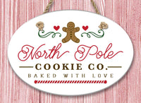 North Pole Inc. Oval Ceramic Wall Decor